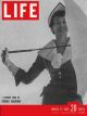 Life Magazine, March 13, 1950 - Spring fashion, umbrella