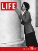 Life Magazine, June 21, 1937 - Woman Kissing Column