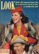 Look Magazine, October 21, 1941 - Woman and man at a university game 