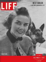 Life Magazine, December 4, 1950 - West Berliners, woman with dog
