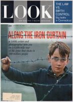 Look Magazine, January 30, 1962 - Boy behind barbed wire fence